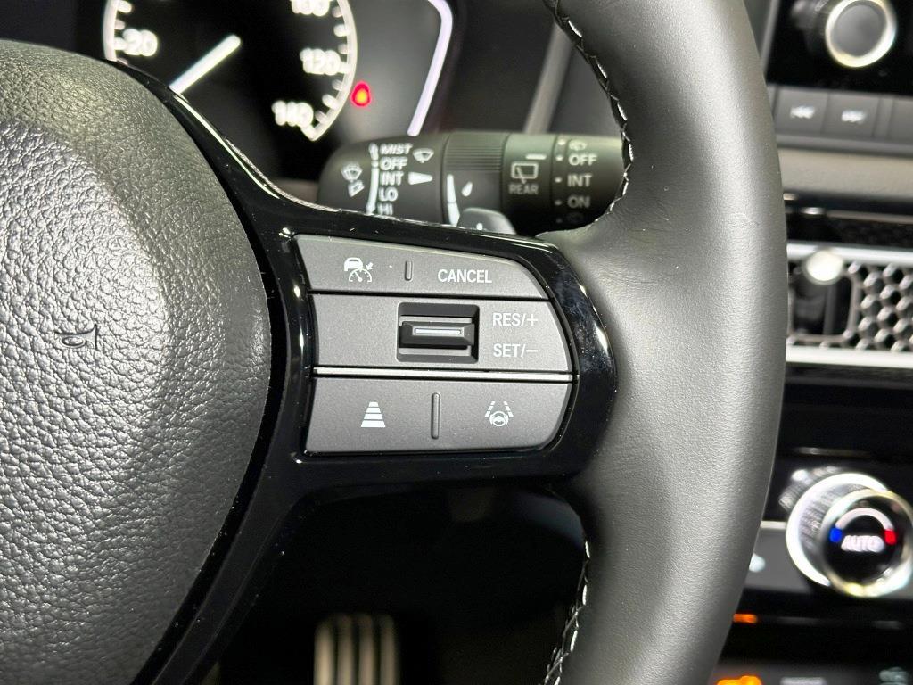 2026 Honda Civic Hatchback Sport - Solar Silver Metallic exterior view 17