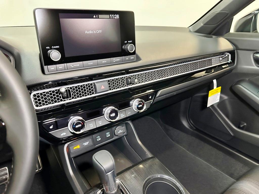 2026 Honda Civic Hatchback Sport - Solar Silver Metallic exterior view 18