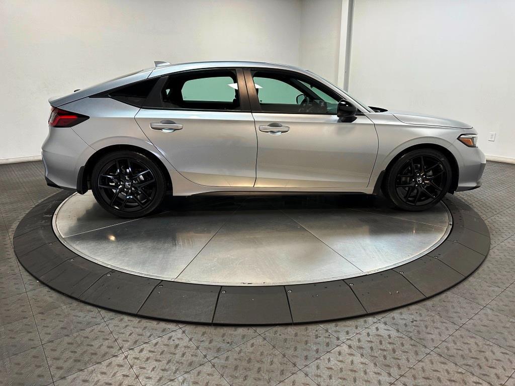 2026 Honda Civic Hatchback Sport - Solar Silver Metallic exterior view 9