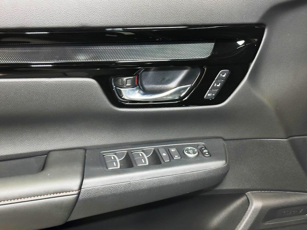 2026 Honda CR-V Hybrid Sport Touring - Crystal Black Pearl exterior view 12