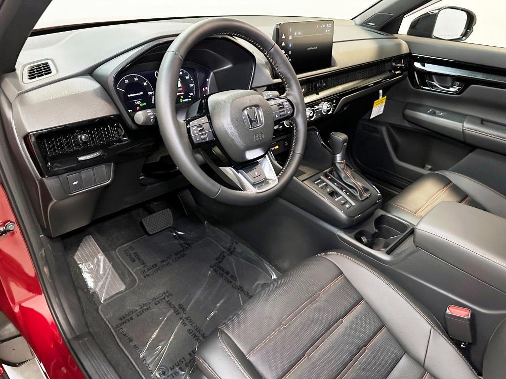 2026 Honda CR-V Hybrid Sport Touring - Radiant Red Metallic exterior view 15