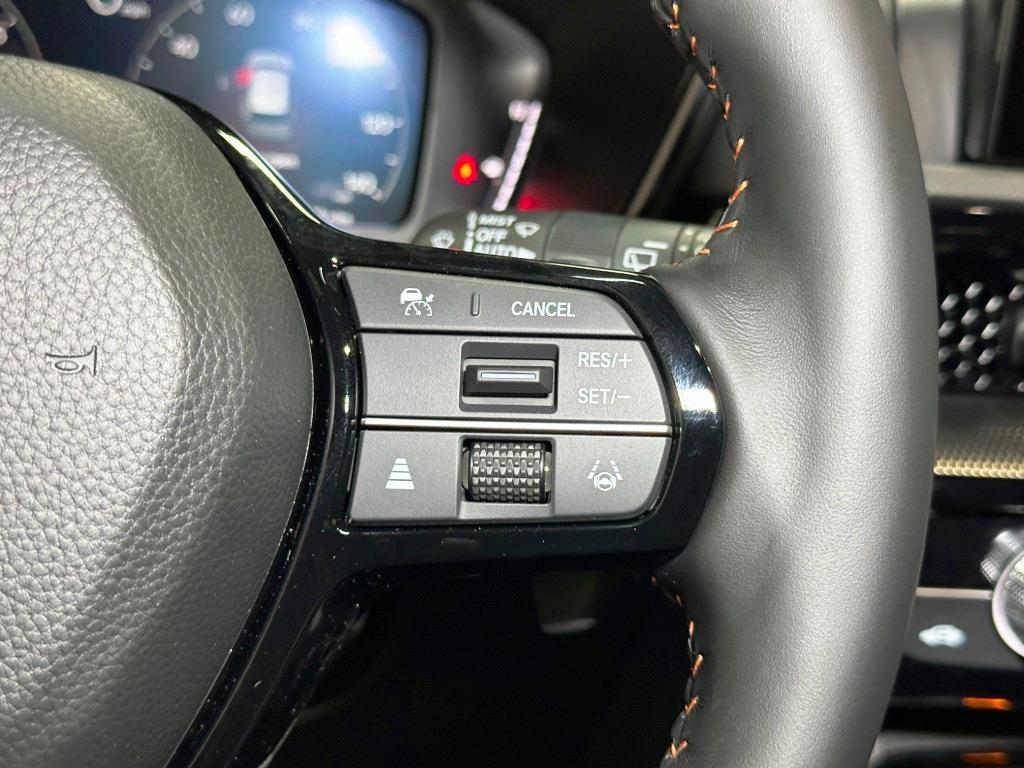 2026 Honda CR-V Hybrid Sport Touring - Radiant Red Metallic exterior view 17