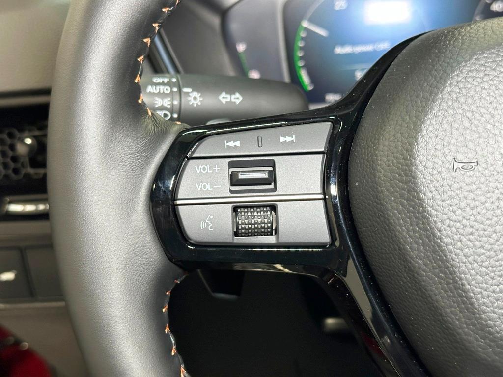 2026 Honda CR-V Hybrid Sport Touring - Radiant Red Metallic exterior view 16