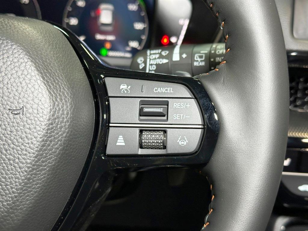 2026 Honda CR-V Hybrid Sport Touring - Platinum White Pearl exterior view 17