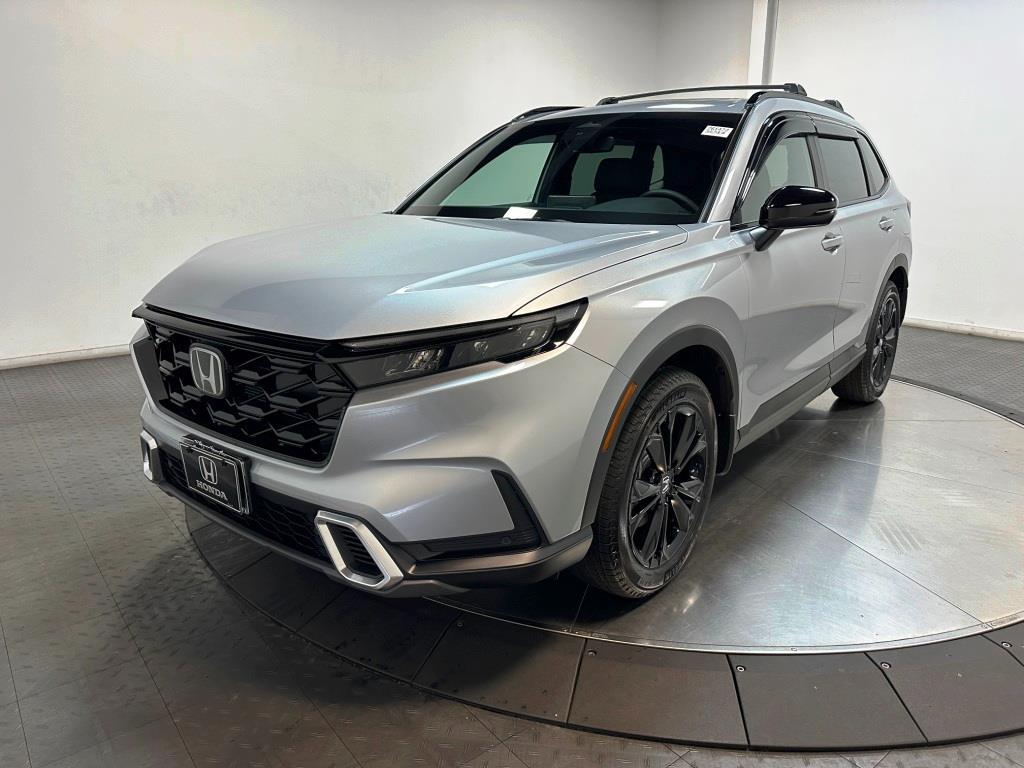 2026 Honda CR-V Hybrid Sport Touring - Solar Silver Metallic exterior view 4