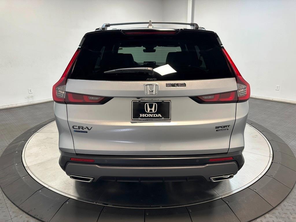2026 Honda CR-V Hybrid Sport Touring - Solar Silver Metallic exterior view 7