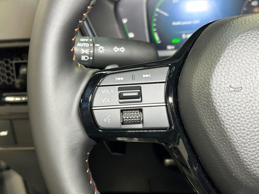 2026 Honda CR-V Hybrid Sport Touring - Solar Silver Metallic exterior view 16