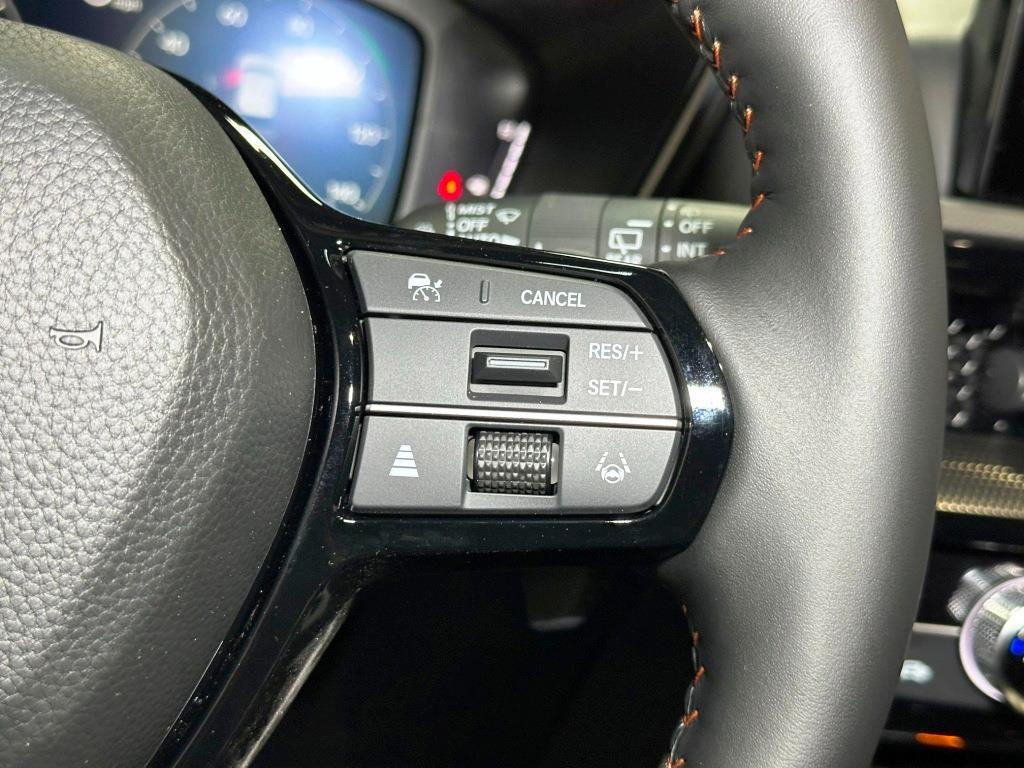 2026 Honda CR-V Hybrid Sport Touring - Solar Silver Metallic exterior view 17