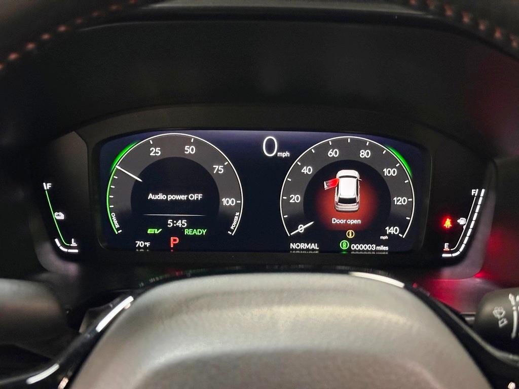 2026 Honda CR-V Hybrid Sport Touring - Solar Silver Metallic exterior view 18