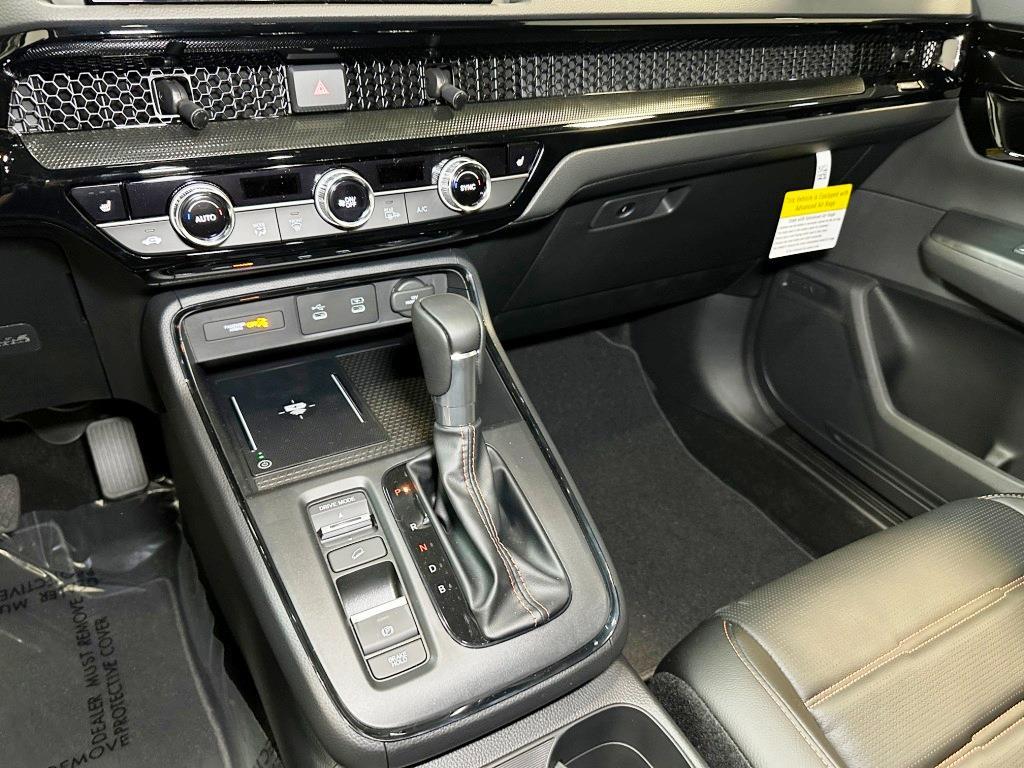 2026 Honda CR-V Hybrid Sport Touring - Solar Silver Metallic exterior view 20