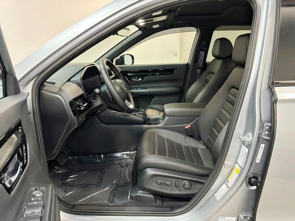 2026 Honda CR-V Hybrid Sport Touring - Solar Silver Metallic exterior view 13