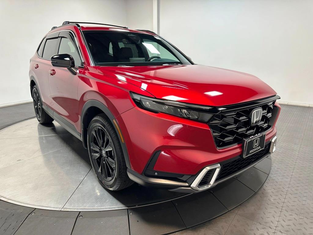 2026 Honda CR-V Hybrid Sport Touring - Radiant Red Metallic exterior view 2