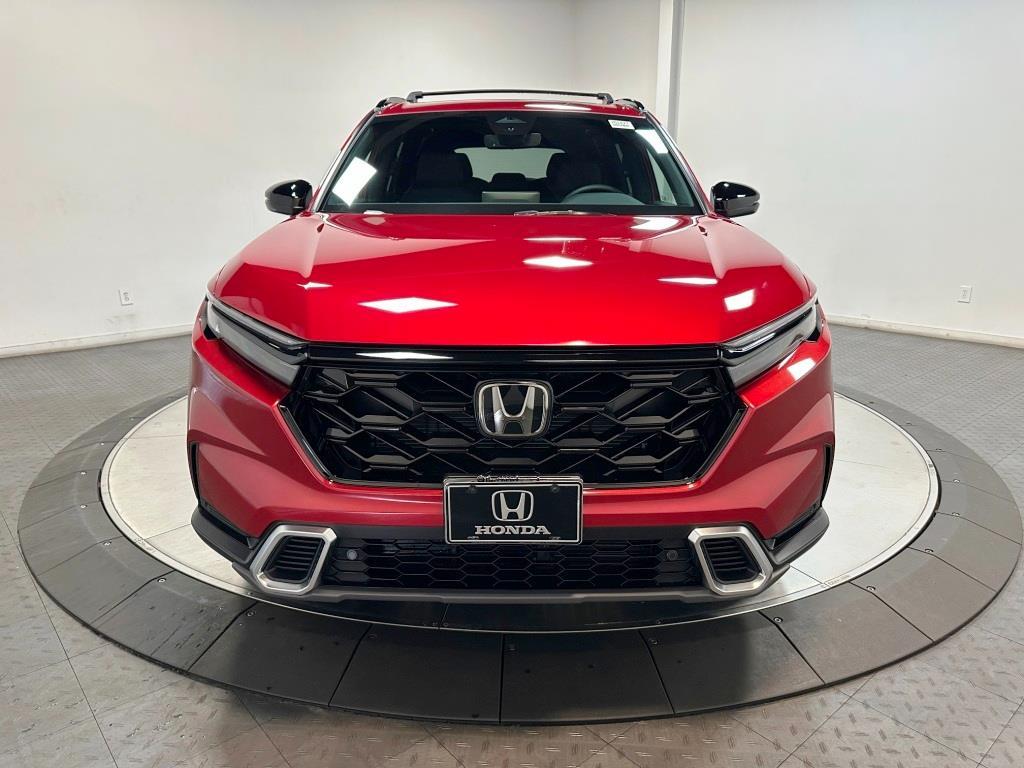 2026 Honda CR-V Hybrid Sport Touring - Radiant Red Metallic exterior view 3