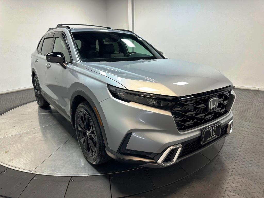 2026 Honda CR-V Hybrid Sport Touring - Solar Silver Metallic exterior view 2