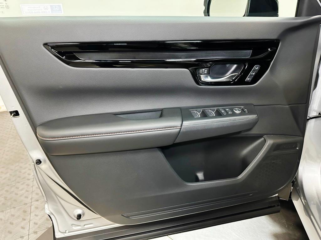 2026 Honda CR-V Hybrid Sport Touring - Solar Silver Metallic exterior view 11