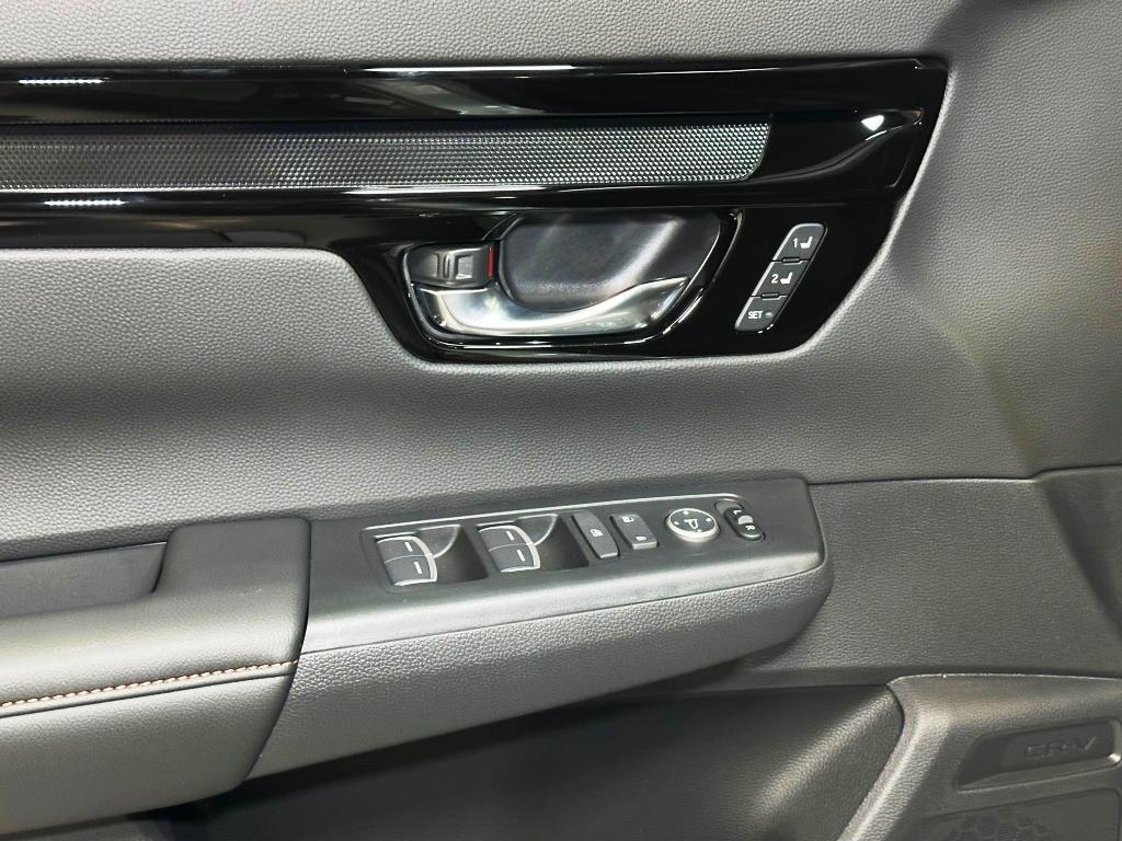 2026 Honda CR-V Hybrid Sport Touring - Solar Silver Metallic exterior view 12