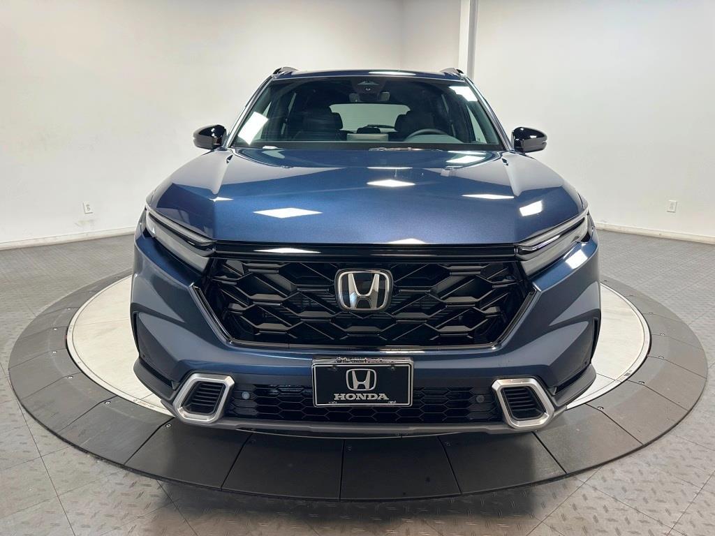 2026 Honda CR-V Hybrid Sport Touring - Canyon River Blue Metallic exterior view 3
