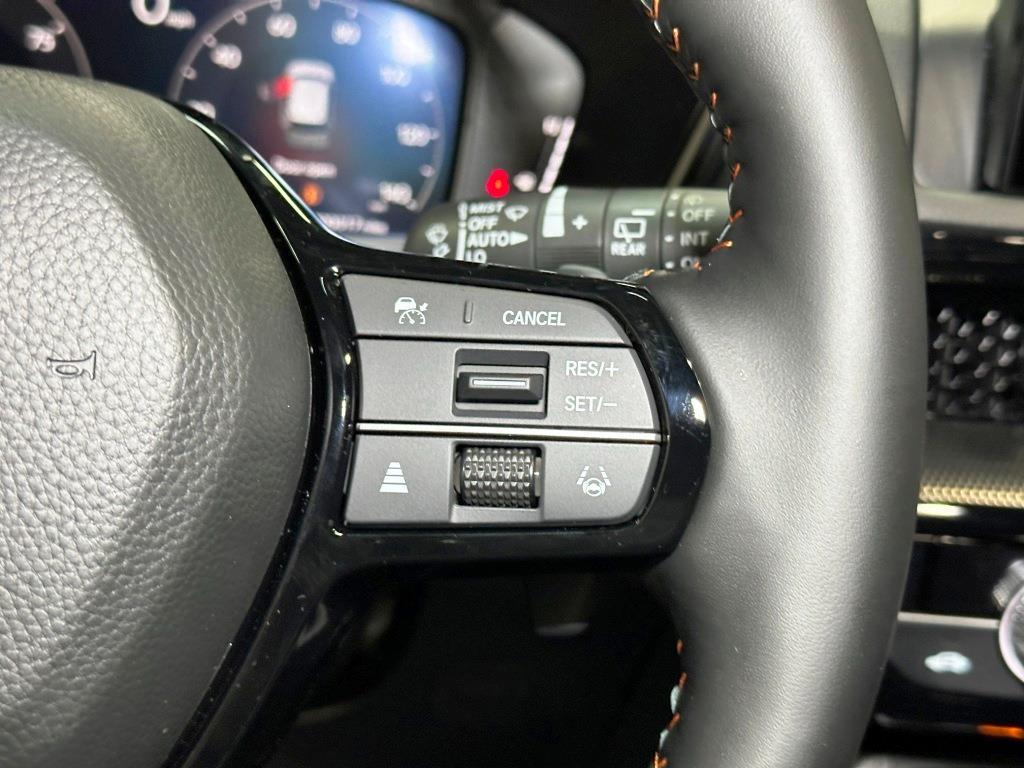 2026 Honda CR-V Hybrid Sport Touring - Meteorite Gray Metallic exterior view 17