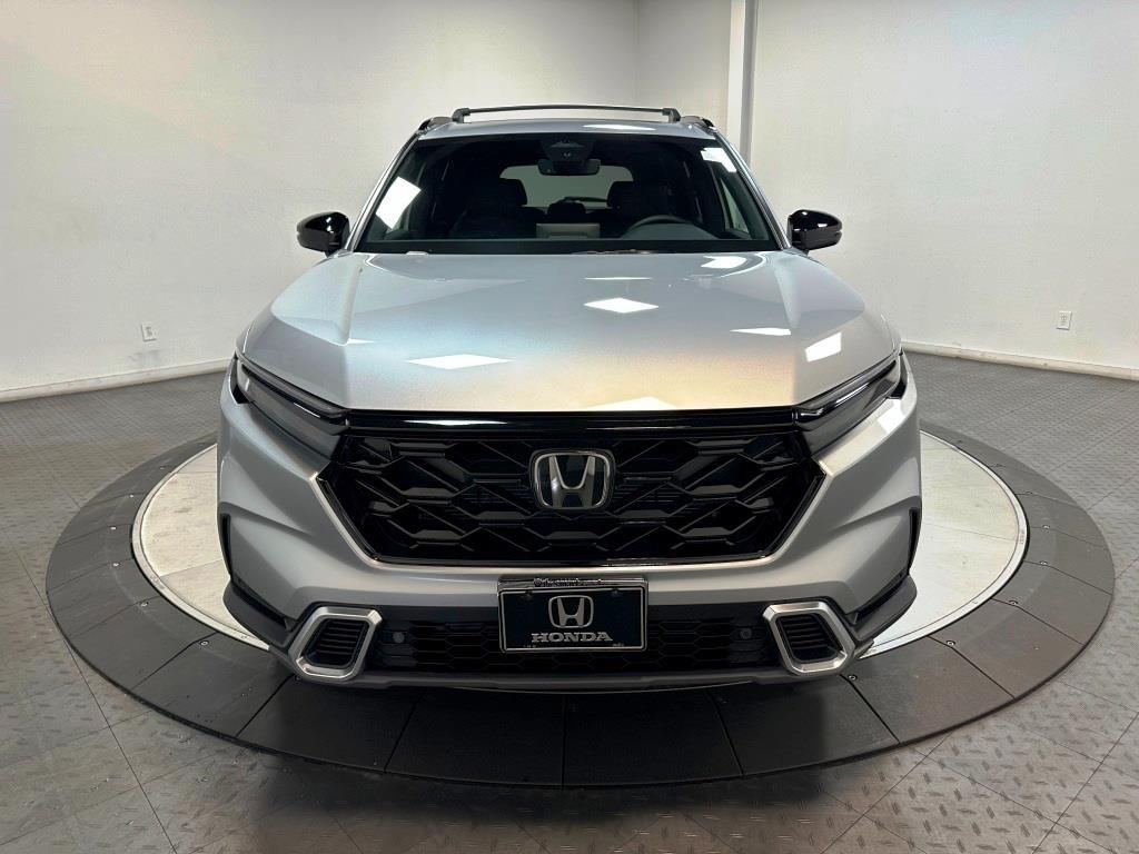 2026 Honda CR-V Hybrid Sport Touring - Solar Silver Metallic exterior view 3