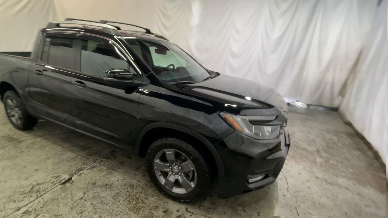 2025 Honda Ridgeline TrailSport - Crystal Black Pearl exterior view 2