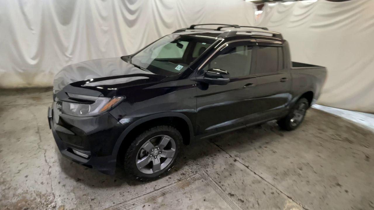 2025 Honda Ridgeline TrailSport - Crystal Black Pearl exterior view 4