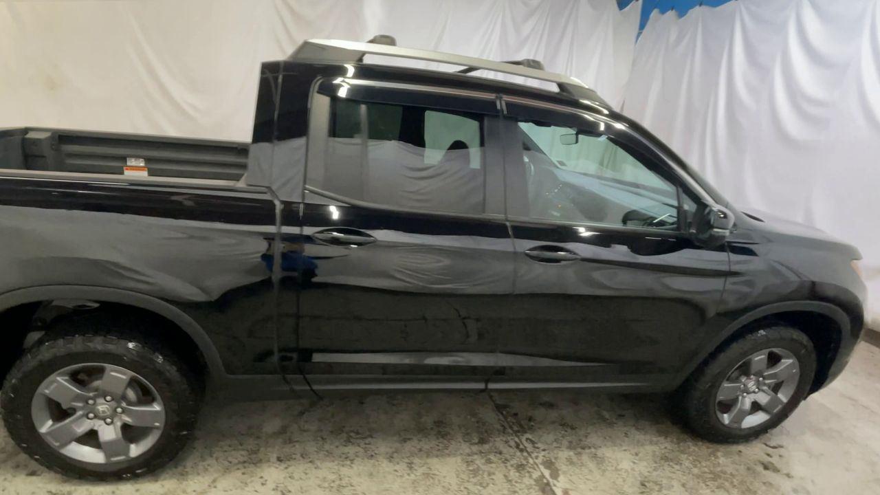 2025 Honda Ridgeline TrailSport - Crystal Black Pearl exterior view 9