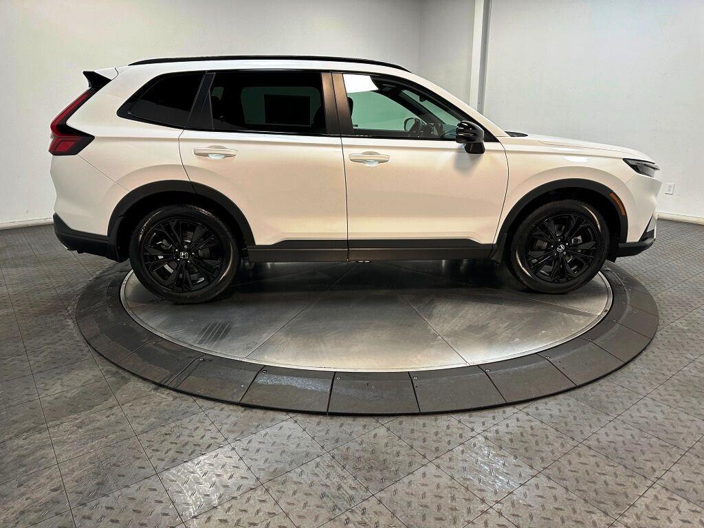 2026 Honda CR-V Hybrid Sport Touring - Platinum White Pearl exterior view 9
