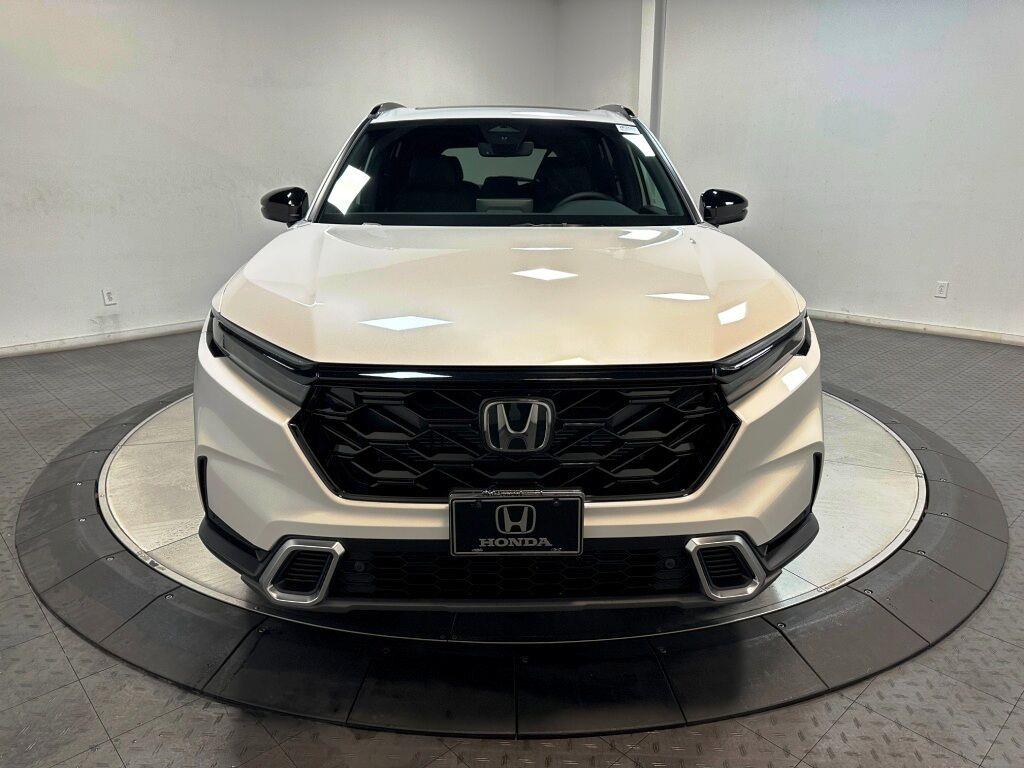 2026 Honda CR-V Hybrid Sport Touring - Platinum White Pearl exterior view 3