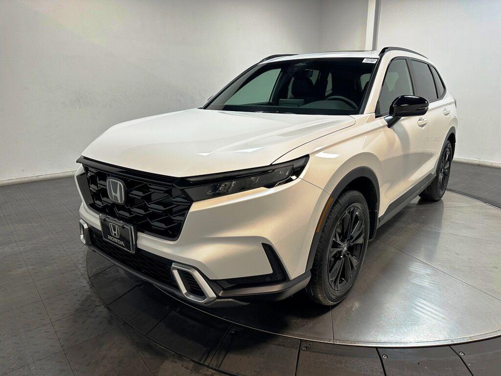 2026 Honda CR-V Hybrid Sport Touring - Platinum White Pearl exterior view 4