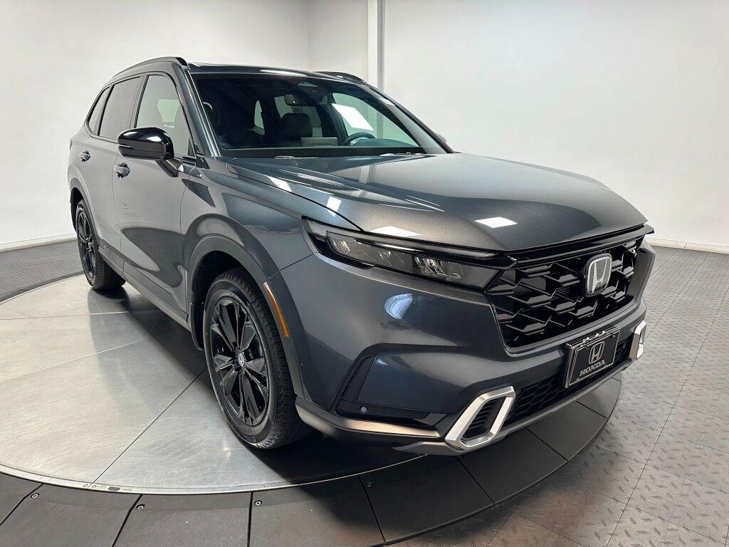 2026 Honda CR-V Hybrid Sport Touring - Meteorite Gray Metallic exterior view 2
