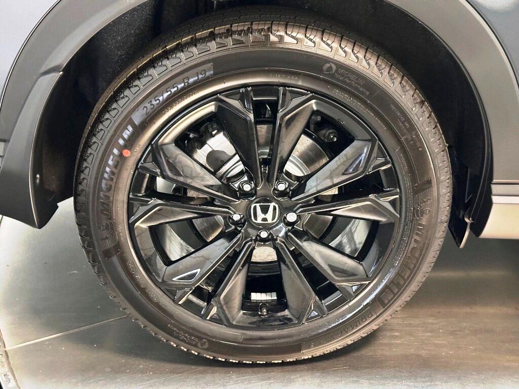 2026 Honda CR-V Hybrid Sport Touring - Meteorite Gray Metallic exterior view 10