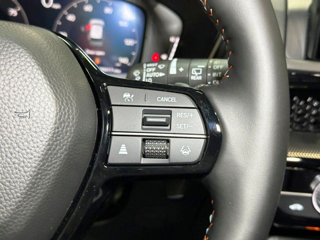 2026 Honda CR-V Hybrid Sport Touring - Meteorite Gray Metallic exterior view 17