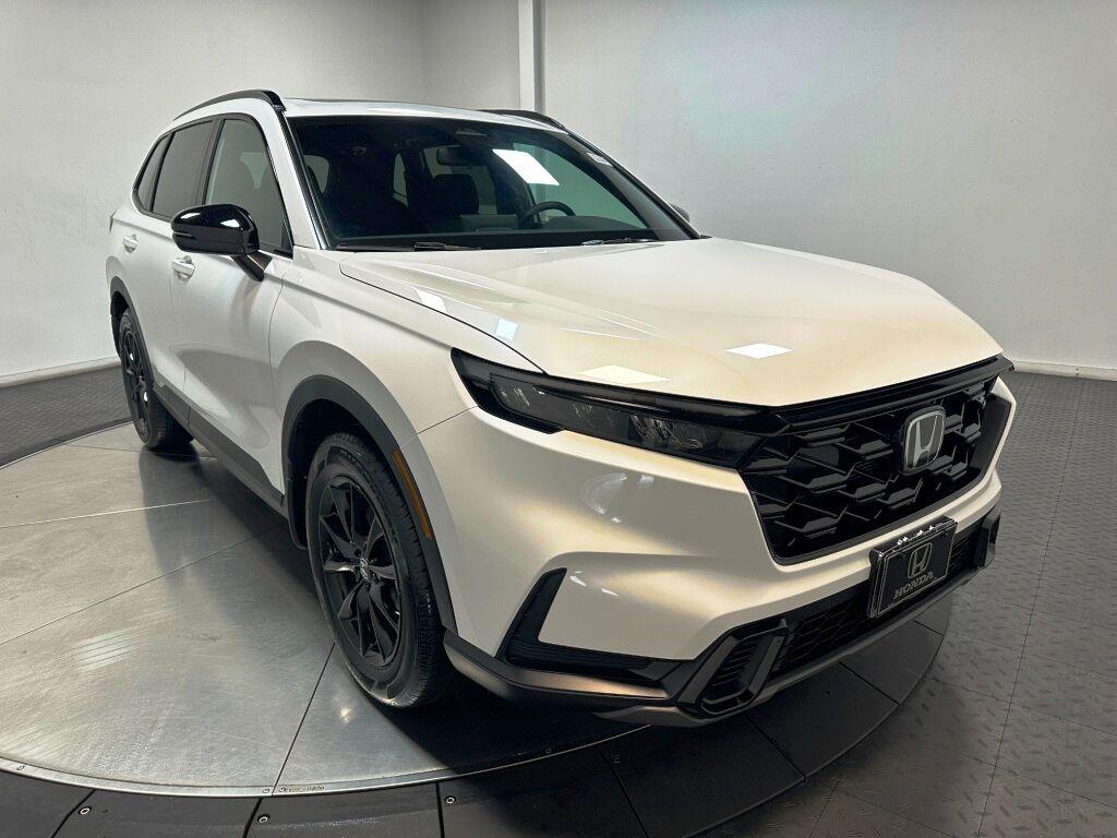2026 Honda CR-V Hybrid Sport Touring - Platinum White Pearl exterior view 2