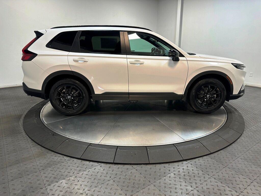 2026 Honda CR-V Hybrid Sport Touring - Platinum White Pearl exterior view 9