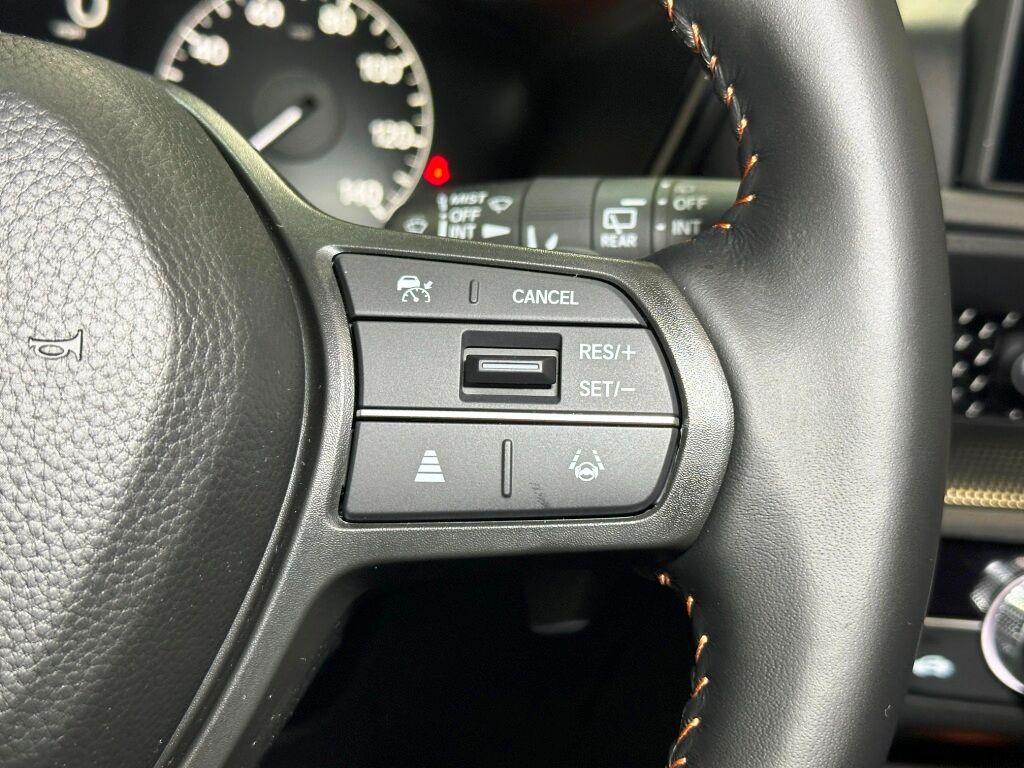 2026 Honda CR-V Hybrid Sport Touring - Platinum White Pearl exterior view 17