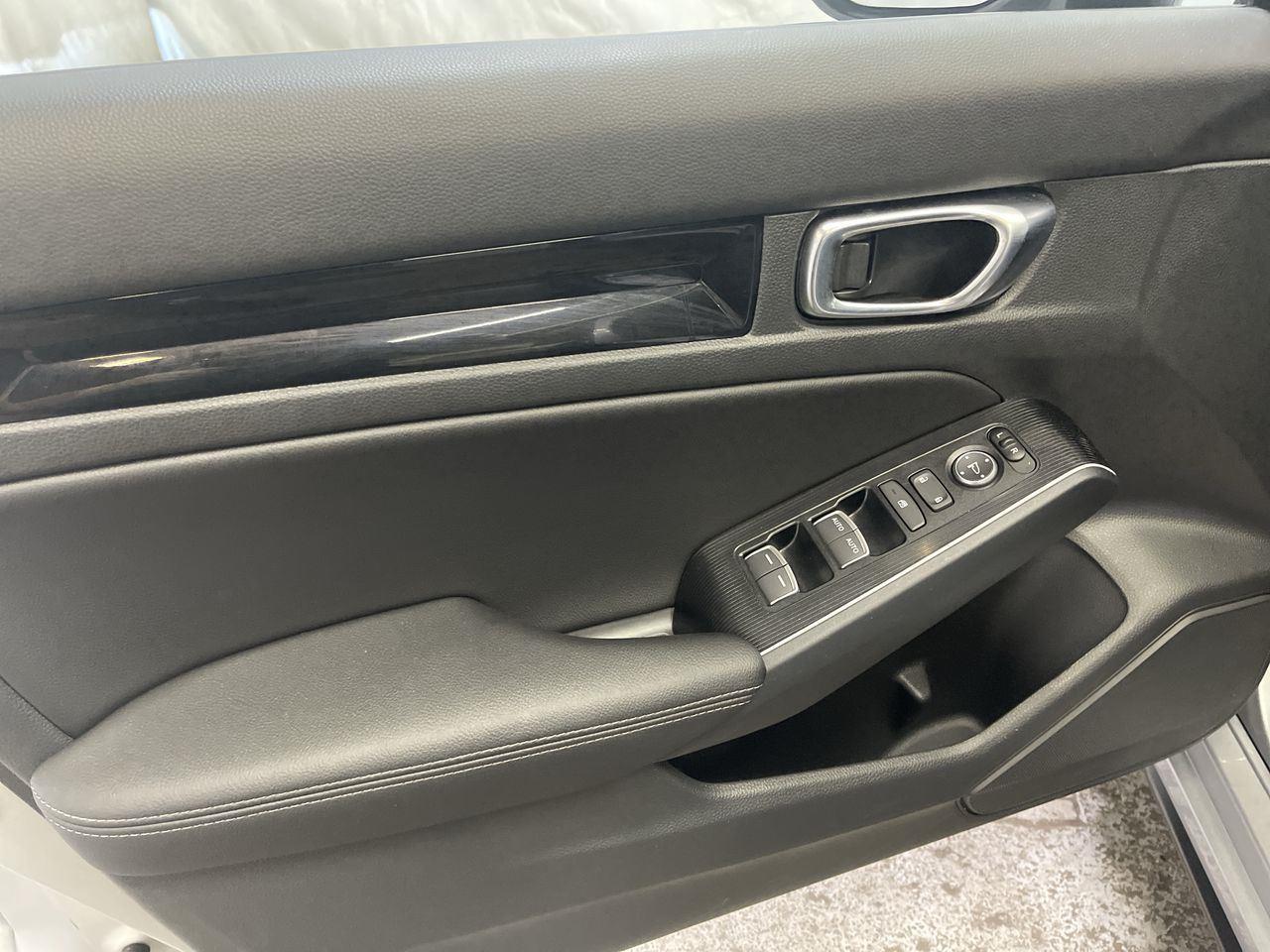 2025 Honda Civic Hatchback Hybrid Sport Touring - Solar Silver Metallic exterior view 13