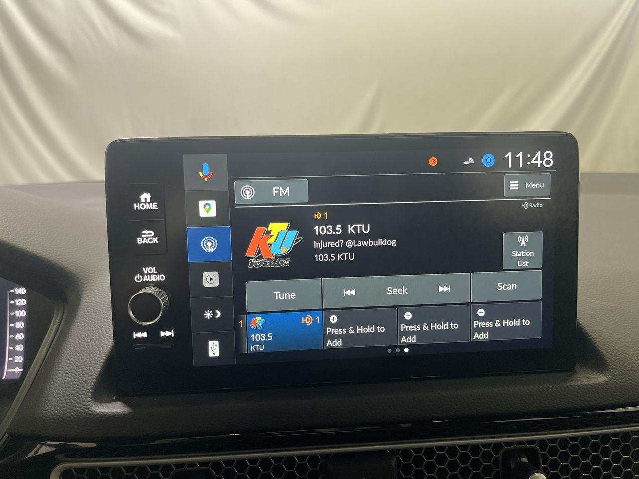 2025 Honda Civic Hatchback Hybrid Sport Touring - Solar Silver Metallic exterior view 16