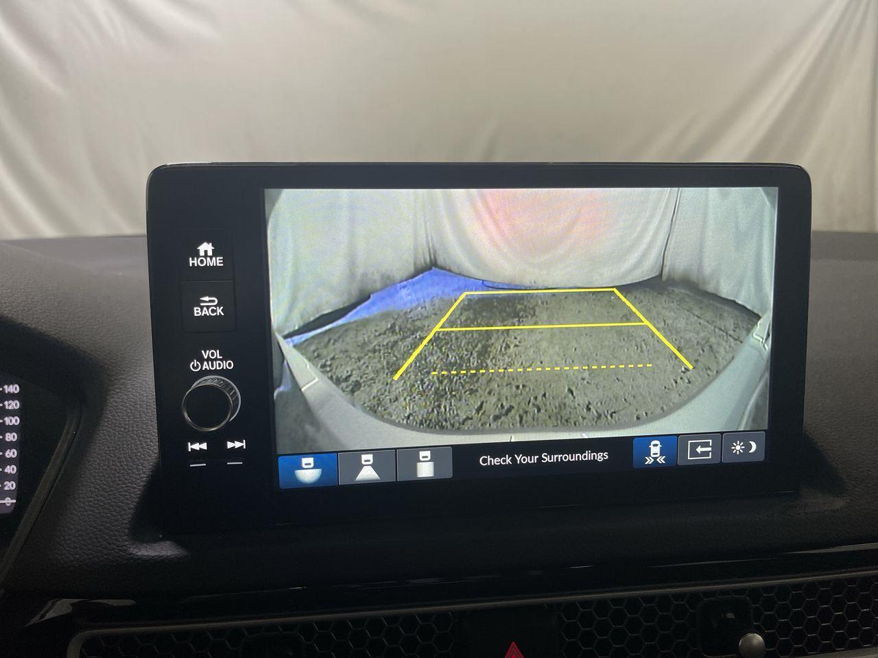 2025 Honda Civic Hatchback Hybrid Sport Touring - Solar Silver Metallic exterior view 17