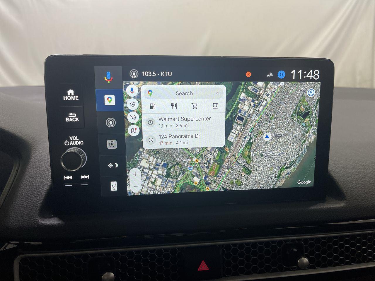 2025 Honda Civic Hatchback Hybrid Sport Touring - Solar Silver Metallic exterior view 18