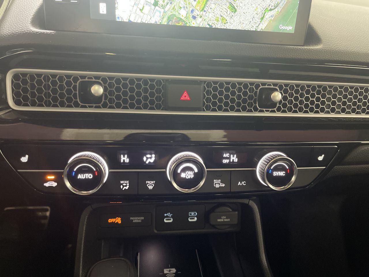 2025 Honda Civic Hatchback Hybrid Sport Touring - Solar Silver Metallic exterior view 19