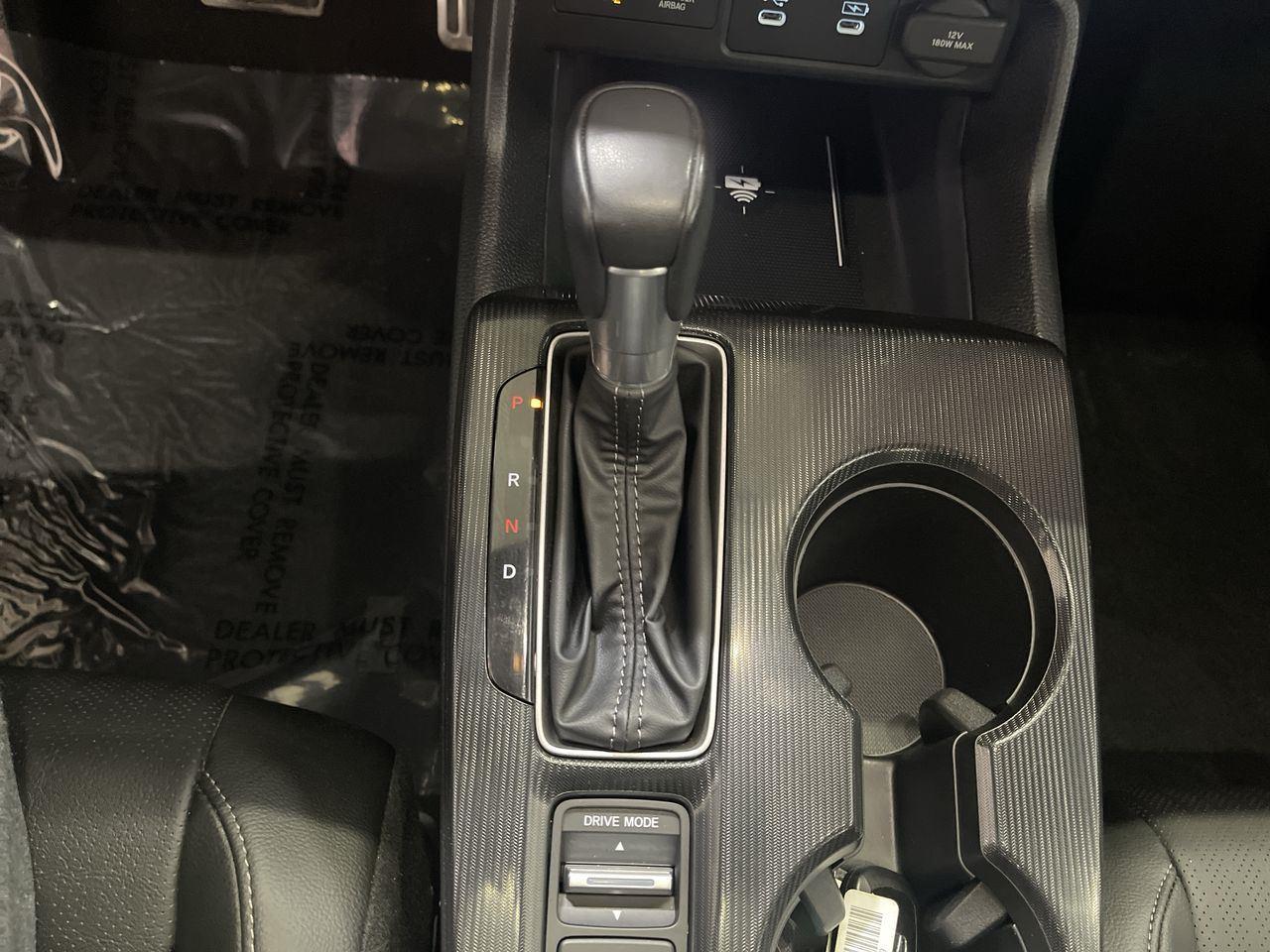 2025 Honda Civic Hatchback Hybrid Sport Touring - Solar Silver Metallic exterior view 20