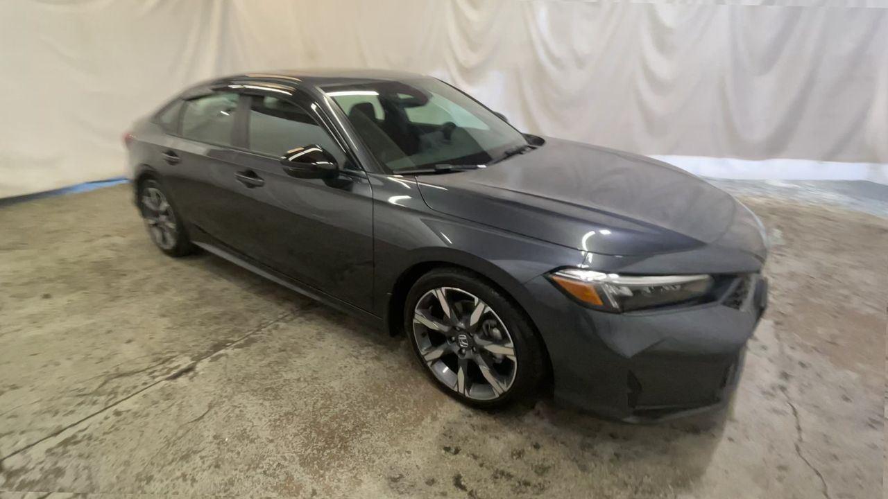 2025 Honda Civic Sedan Hybrid Sport Touring - Meteorite Gray Metallic exterior view 2