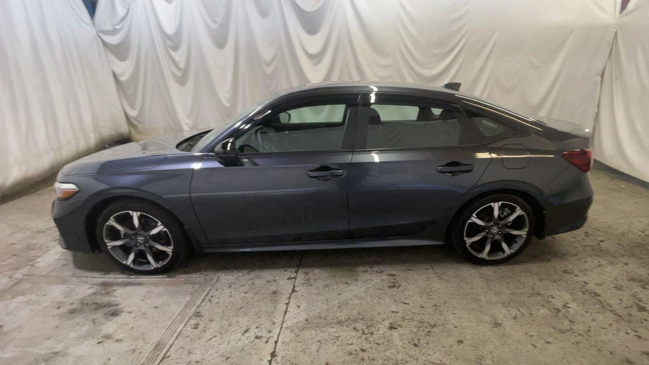 2025 Honda Civic Sedan Hybrid Sport Touring - Meteorite Gray Metallic exterior view 5