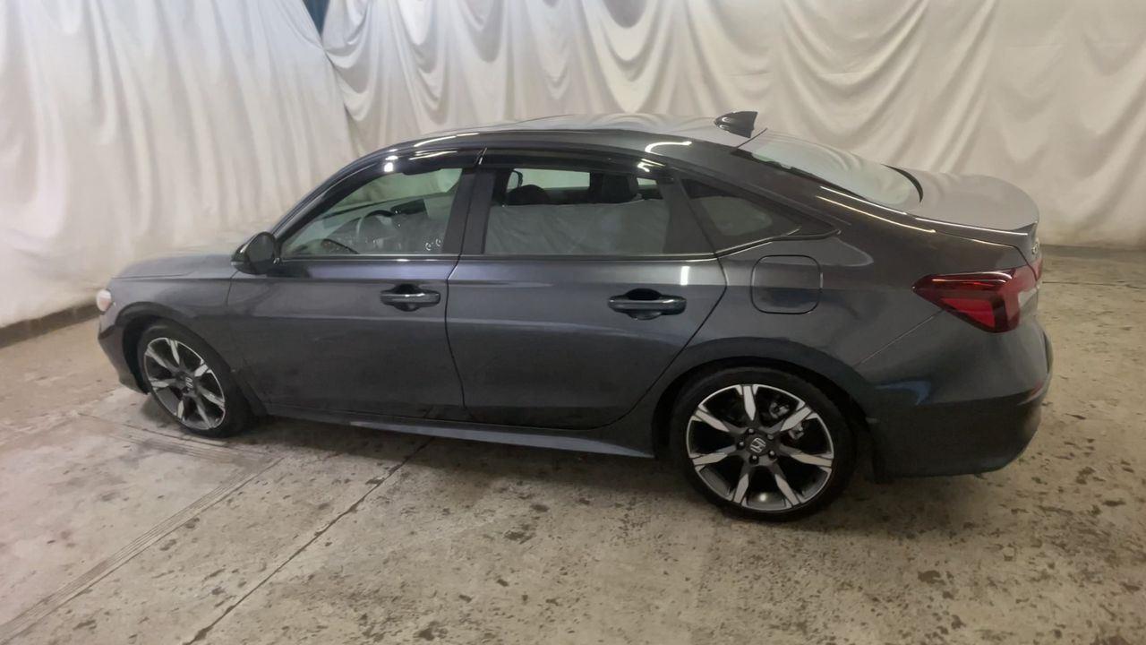 2025 Honda Civic Sedan Hybrid Sport Touring - Meteorite Gray Metallic exterior view 6