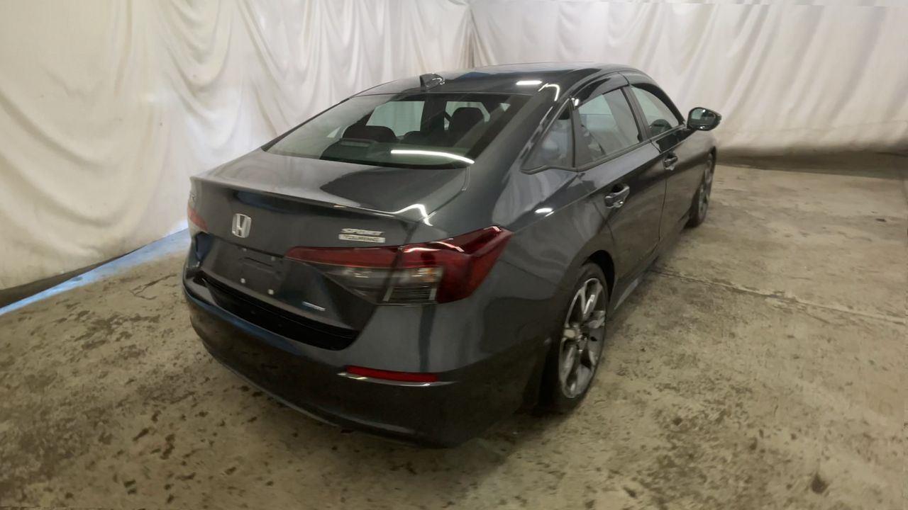 2025 Honda Civic Sedan Hybrid Sport Touring - Meteorite Gray Metallic exterior view 8