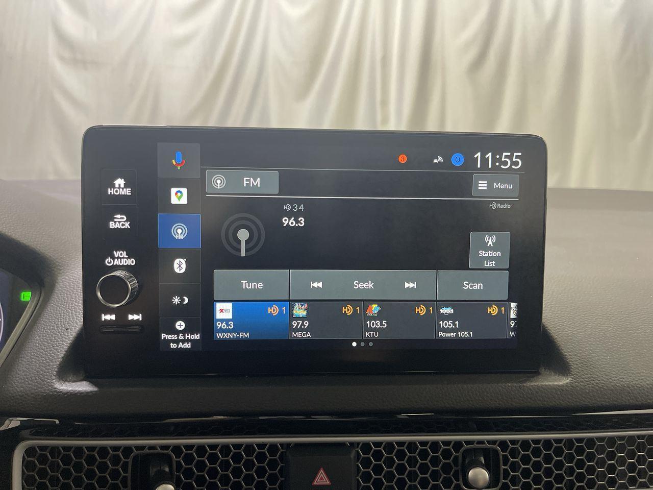 2025 Honda Civic Sedan Hybrid Sport Touring - Meteorite Gray Metallic exterior view 16