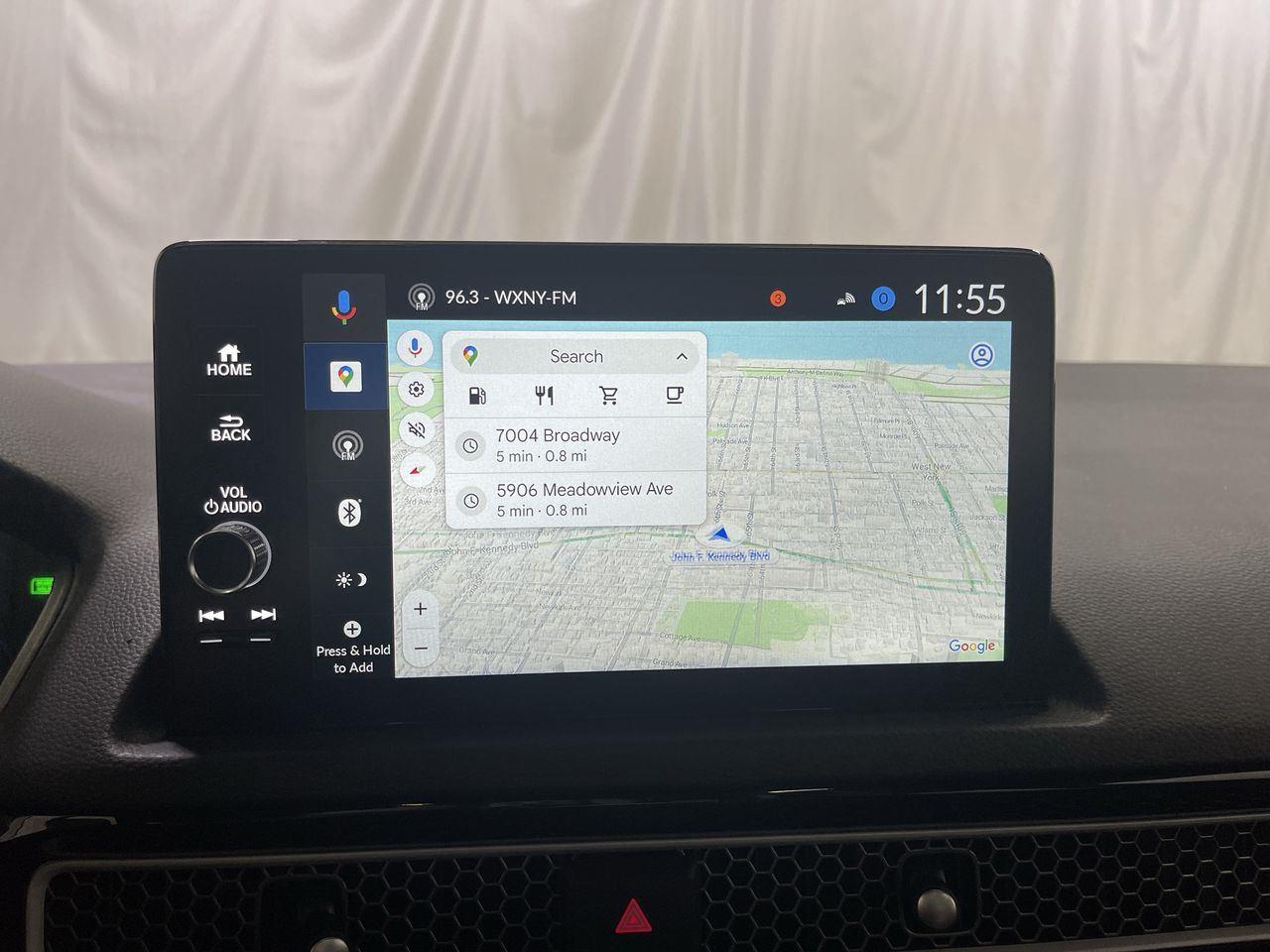 2025 Honda Civic Sedan Hybrid Sport Touring - Meteorite Gray Metallic exterior view 18