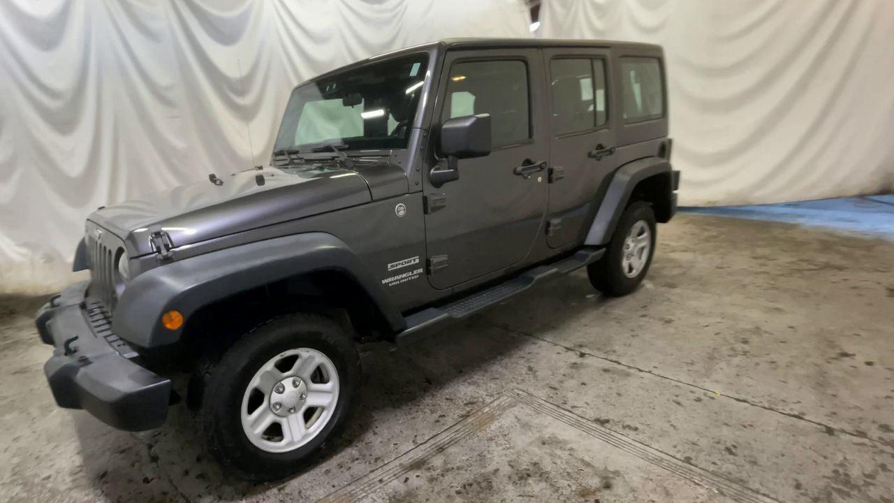2014 Jeep Wrangler Unlimited Sport - Granite Crystal Metallic Clearcoat exterior view 4