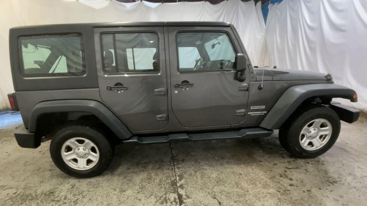 2014 Jeep Wrangler Unlimited Sport - Granite Crystal Metallic Clearcoat exterior view 9