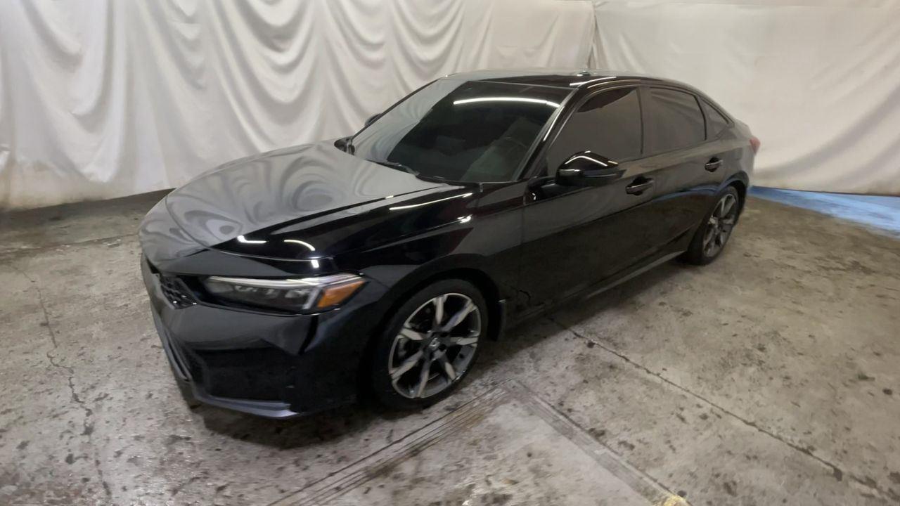 2025 Honda Civic Sedan Hybrid Sport Touring - Crystal Black Pearl exterior view 4